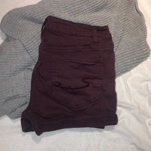 Garnet (or maroon) coloured jean shorts!